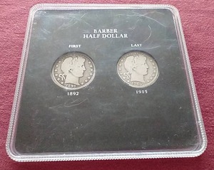 lot 60 image: (2) Barber Half Dollars in Case