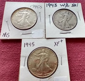 lot 69 image: (3) Walking Liberty Half Dollars
