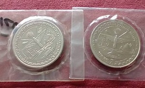 lot 81 image: (2) Marshall Islands Commemorative Coins - Elvis Presley & Desert Storm