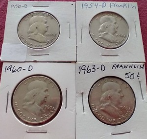 lot 113 image: (4) Franklin Half Dollars