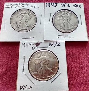 lot 170 image: (3) Walking Liberty Half Dollars