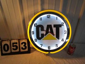 lot 53 image: Caterpillar Neon Wall Clock