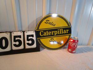lot 55 image: Caterpillar Sales and Service Sign
