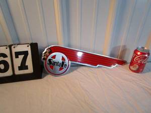 lot 67 image: Santa Fe Metal Chief Head Sign