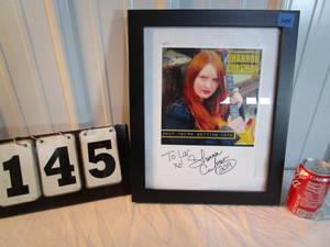 lot 145 image: Framed-Signed Shannon Curfman Show Photo