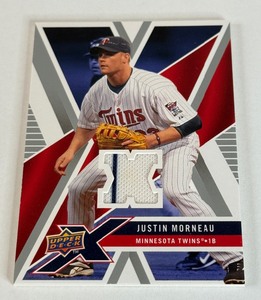 lot 142 image: Justin Morneau Game-Used Relic 2009 Upper Deck X #UDXM-MO Minnesota Twins Baseball Card