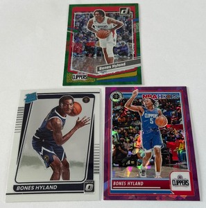 lot 236 image: Bones Hyland 3 Card Lot - 2021 Donruss Optic RC, 2023 -24Pink Ice Prizm 149 and Holo Green Laser Basketball Cards