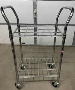 lot 56 image: MSRP $150  Drive Medical 18143 Oxygen Cylinder Cart, Chrome 12-Cylinder Capacity, Mobile Medical Gas Storage &amp Transport Cart, Heavy-Duty Rolling Frame for Hospitals Clinics EMS Facilities