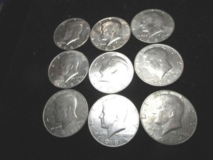 lot 15 image: Nine Kennedy Half Dollars