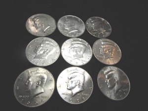 lot 16 image: Nine Kennedy Half Dollars