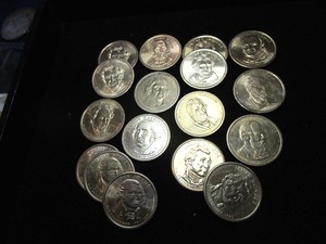 lot 24 image: Seventeen Presidential Dollar Coins