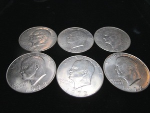 lot 32 image: Six Eisenhower Silver Dollars