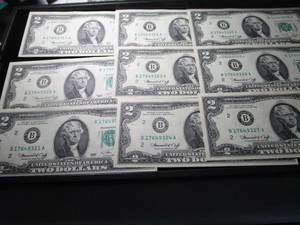 lot 110 image: Nine Consecutively Numbered $2