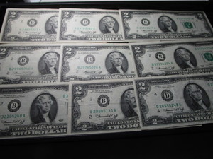 lot 112 image: Nine Two Dollar Bills