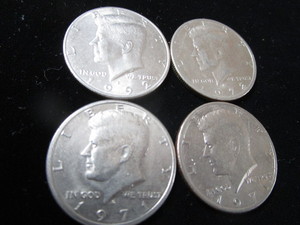 lot 120 image: Four Kennedy Half Dollar