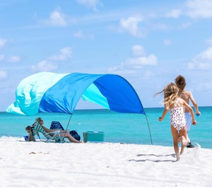 lot 152 image: Shibumi Shade Classic with Quiet Canopy, The Original Wind-Powered Beach Shade, Shade for 8 People, Weighs Only 4 lbs, Sets up in 3 Minutes. Wind Assist Included