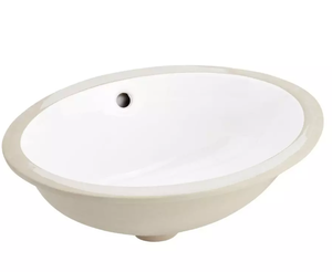 lot 176 image: Signature Hardware 18 Mangrove Oval Porcelain Undermount Bathroom Sink - White