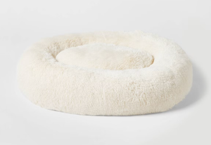 lot 271 image: Boots & Barkley Donut Bolster Dog Bed - Cream - XL 42 Inches (L), 8 Inches (H) x 32 Inches (W)