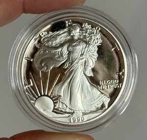 lot 15 image: 1990 S-American Eagle Liberty Proof Silver Dollar - just the coin in a protective plastic case