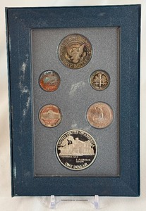 lot 31 image: 1990 Prestige Eisehhower Centennial Silver Proof set 6 coins - plastic case only, no COA, minor fire damage on all coins except silver dollar