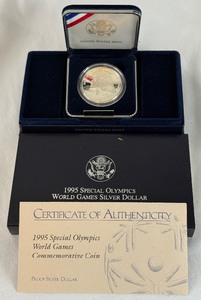 lot 32 image: 1995 W-Special Olympics World Games Proof Silver Dollar - original package with COA
