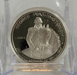 lot 72 image: 1982 S-George Washington Half Dollar 250th Anniversary Coin uncirculated - coin in cello shrink wrap with cardboard description case
