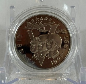 lot 85 image: 1995 1991-1995-P World War II 50th Anniversary Proof Clad Half Dollar  - just the coin in a protective plastic case