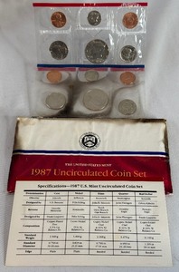 lot 127 image: 1987 uncirculated P & D us mint coin set OGP - original package but with fire damage