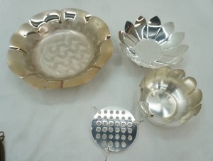 lot 7 image: Silverplate Lotus Flower Bowl Set (3 pieces) and 3 Footed Silver Plated Bowl with Modern Silver sticker on bottom