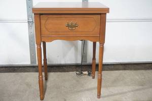 lot 42 image: vintage Sears Kenmore sewing machine in cabinet
