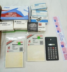 lot 90 image: NewUnused staples, removable labels, envelopes, roll address labels, calculator