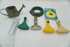 lot 98 image: Sprinklers, Rain Gauge, small galvanized watering can