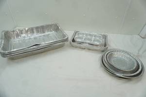 lot 180 image: Aluminum Roasting and Baking Pans (all are new except pie pates)