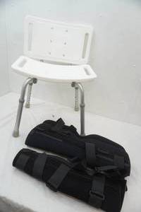 lot 201 image: Shower Chair and large knee bracessplints