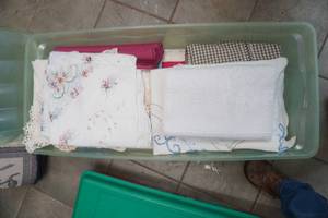 lot 216 image: Table Linens & Storage Container