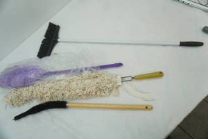 lot 261 image: Dusters, small broom, cleaning brush