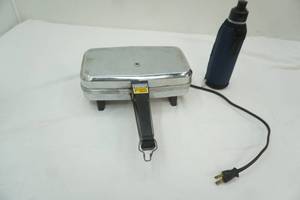 lot 306 image: Vitantonio Pizzelle Chef iron and insulated water bottle
