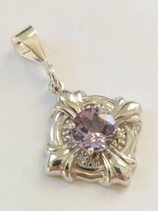 lot 3W image: 925 sterling silver pendant with faceted purple stone ornate floral setting