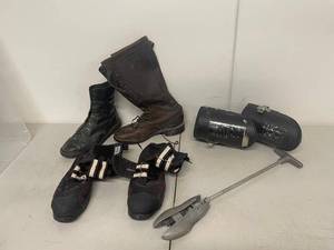 lot 9G image: Gravity Guiding inversion boots, protective over-boots, lace-up boots and metal anchor tool gear lot
