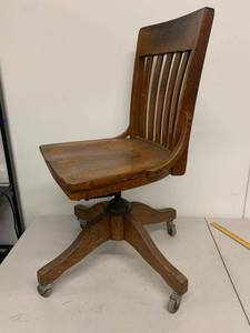 lot 26G image: Vintage Oak Swivel Office Chair on Casters Adjustable Banker Style Wood Desk Chair