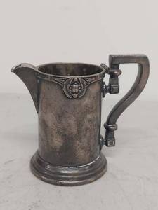 lot 101G image: International Silver Co Murrays 8 oz Silver Soldered Creamer Pitcher with Winged Scarab Emblem