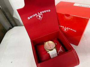lot 21N image: Swiss Legend Planeter Pink Dial Gold Tone Case White Strap Womens Watch