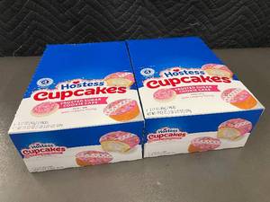 lot 91 image: Hostess Cupcakes Frosted Sugar Cookie Cake with Creamy Filling - 24-Pack (2 Boxes)