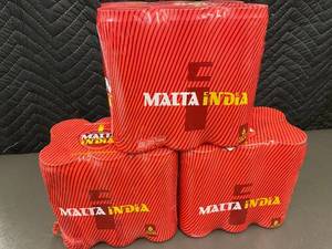 lot 306 image: Malta India Malt Beverage 12 oz Cans (Lot of 18)