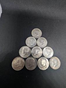 lot 38 image: Lot Of 10 90% 1964 Silver Kennedy Half Dollars