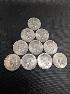 lot 44 image: Kennedy Half Dollars 1964