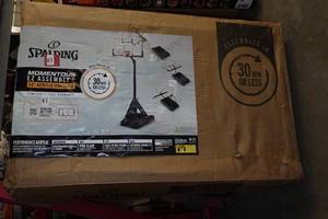 lot 1B image: Spalding Momentus EX Asssembly 54 Acrylic Portable Basketball Hoop