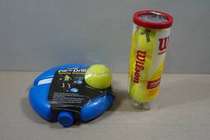 lot 34 image: Wilson Tennis Balls and Trainer
