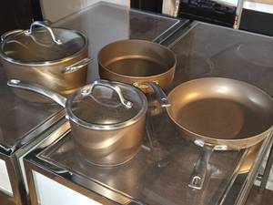 lot 67 image: Lot of (4) Cookware by Cirulon - 9-12x5-12 Pot with Lid, 7-12x5 Pot with Lid, 11 Pan and 9-12 Pan