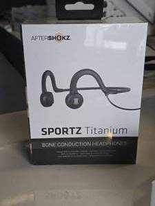 lot 18 image: After Shokz Sportz Titanium Bone Conduction Headphones (in original packaging)